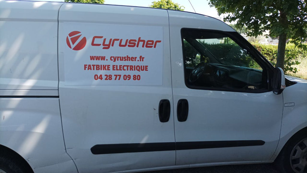 A car with the message of Cyrusher French team on the body