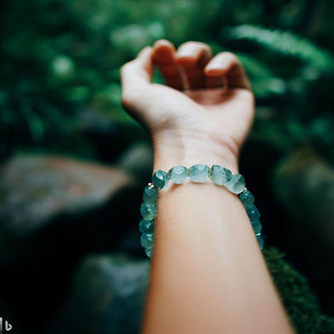 A Person wearing a Beautiful Aquamarine Bracelet in Rainforest