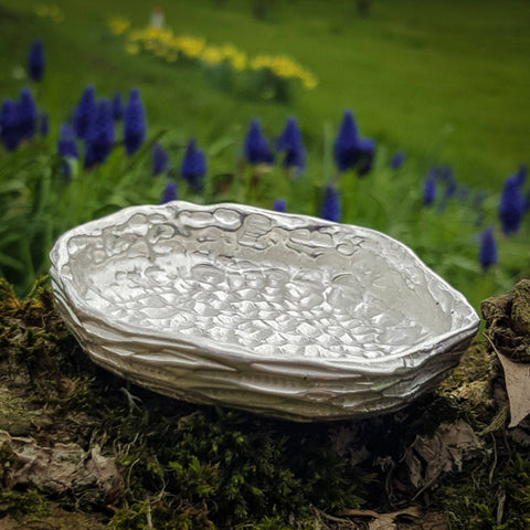 Tree Bark textured solid silver bowl with bluebells behind by Kara Jewellery by Charlotte