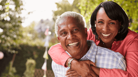Senior Black Couple Happy They Have Found Premium, All-Natural Anti-Aging Serum and Cream