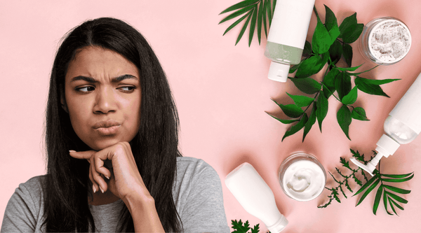 Black woman thinking about potentially harmful chemical ingredients in synthetic cosmetics