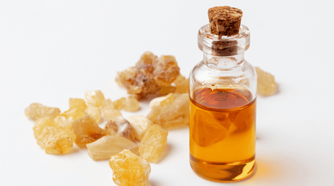 An image of frankincense resin and the botanical extract of frankincense oil.