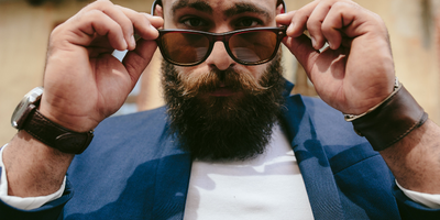 Man with healthy beard growth and beard care