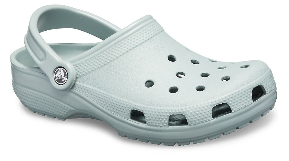 grey and green crocs