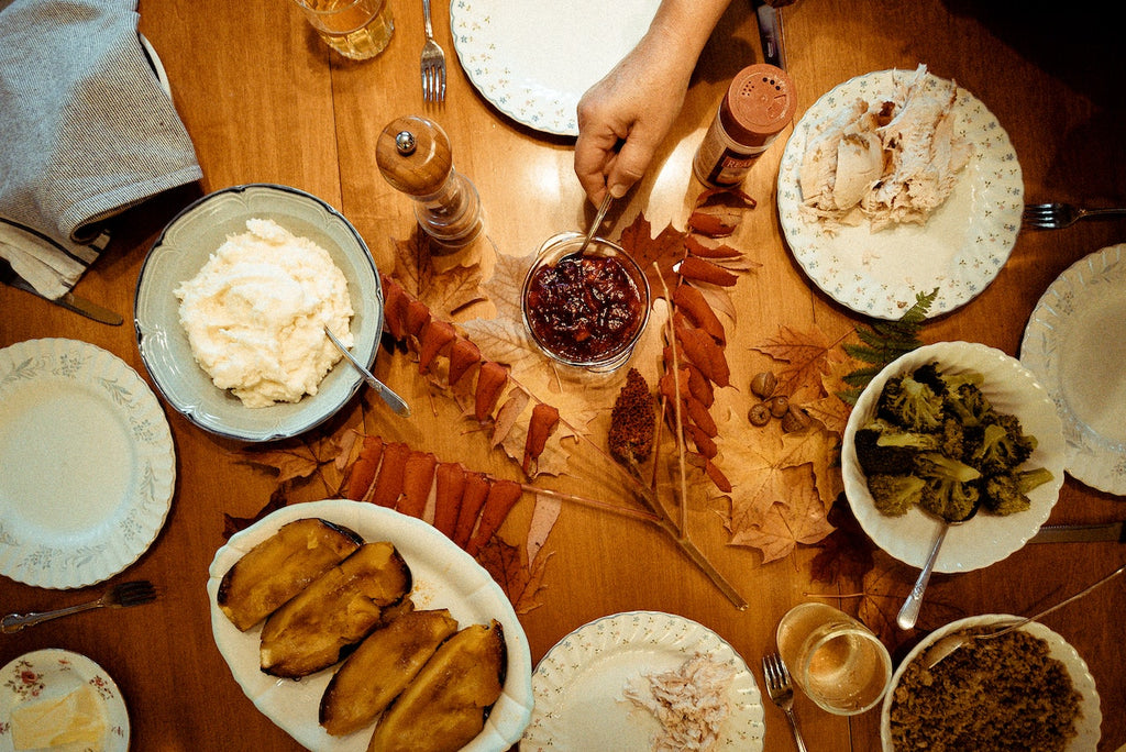 Aerial shot of a dinner table with fall-inspired meals