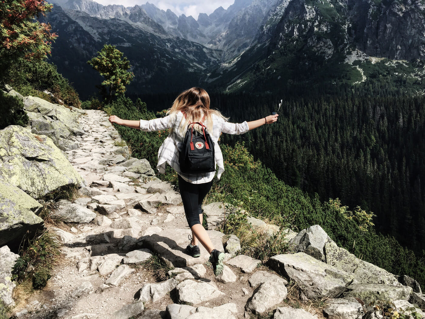 woman with backpack hiking