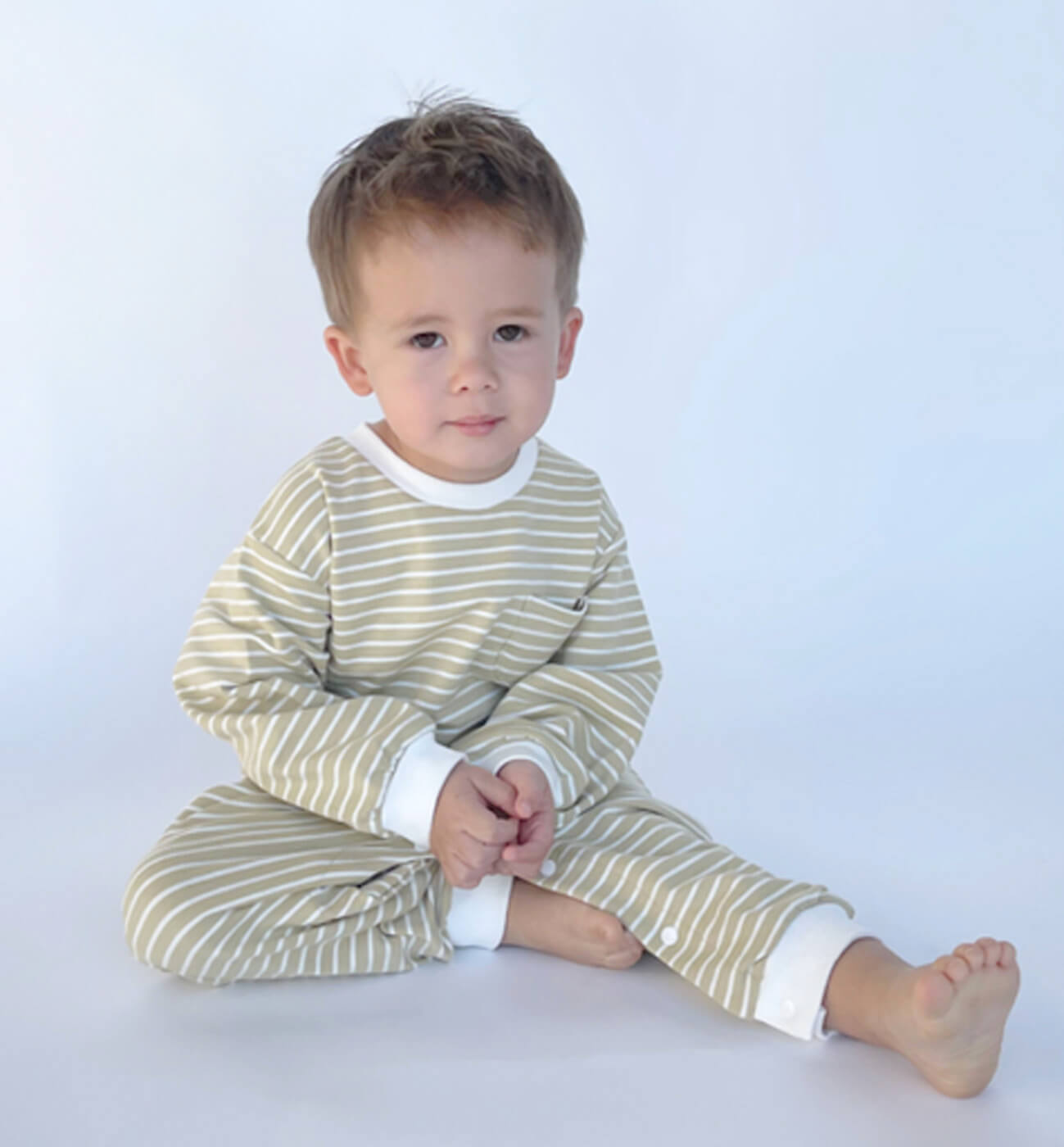 Boy Wearing Hapari Kids Mini Ansley Romper