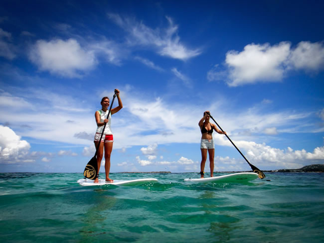 Two Women Paddle Boarding
