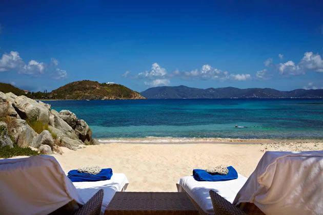 Lounge Chairs Facing the Ocean 