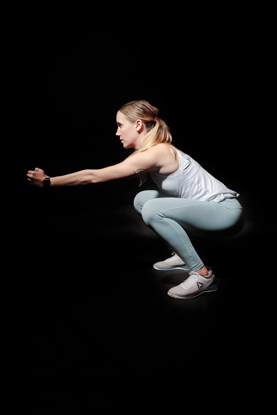 Woman Doing Squats