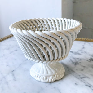 white ceramic pedestal fruit bowl