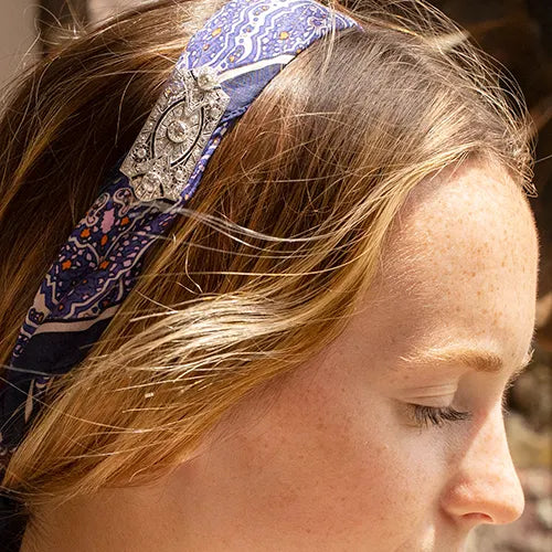 Jeweled broach on headband