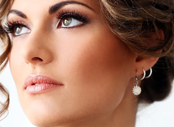 Three earrings in stack on ear stackearrings.webp__PID:87b7a83e-afdd-46f0-aec0-27f93ca2205c
