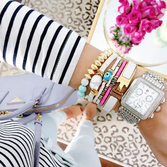 Michelle watch with bracelets stacked