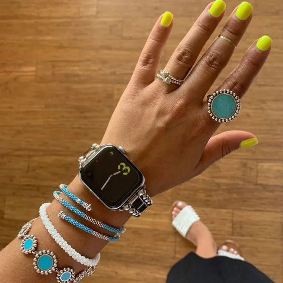 Teal ring and Lagos smart watch bracelet