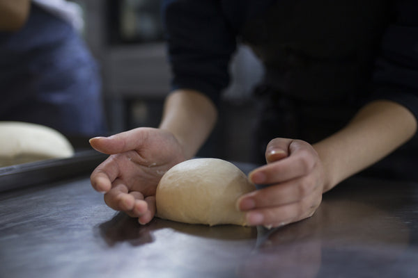 Person working the dough