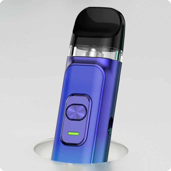 The sleek, metallic blue Smok vape device with a black mouthpiece is displayed upright. It features a rectangular button with a circular design and a small green LED light below it on the front. The device partially emerges from a flat surface.