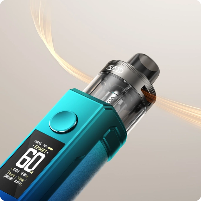 Teal vape mod with digital display and clear tank against a beige background.