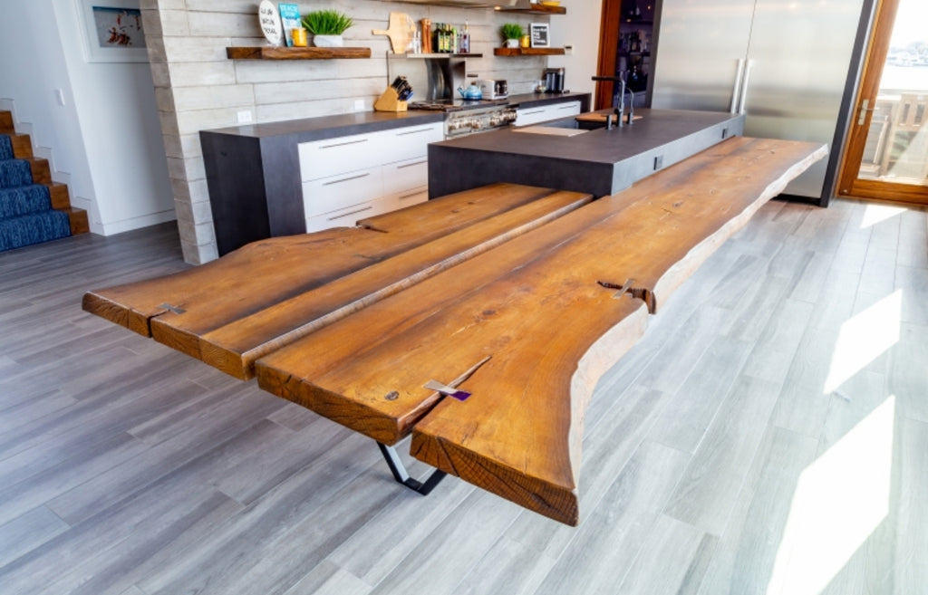Woodform concrete kitchen island with rustic features.
