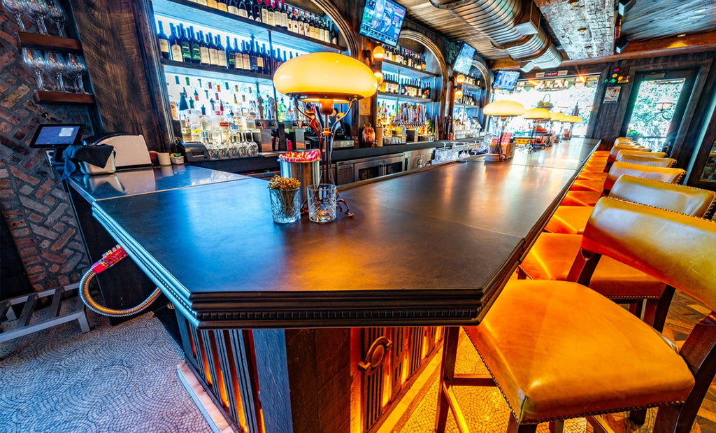 This Woodform Concrete bar top is as rustic and rich as the menu at Elisabetta’s Pizzeria. 