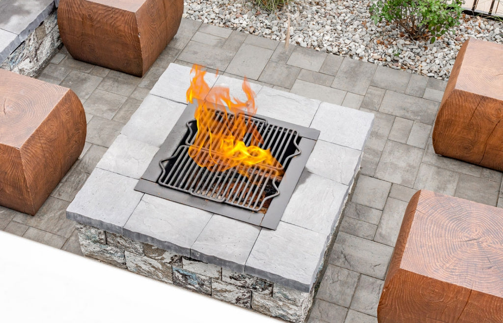 Concrete that looks like wood in a block style seat surrounding an outdoor firepit.