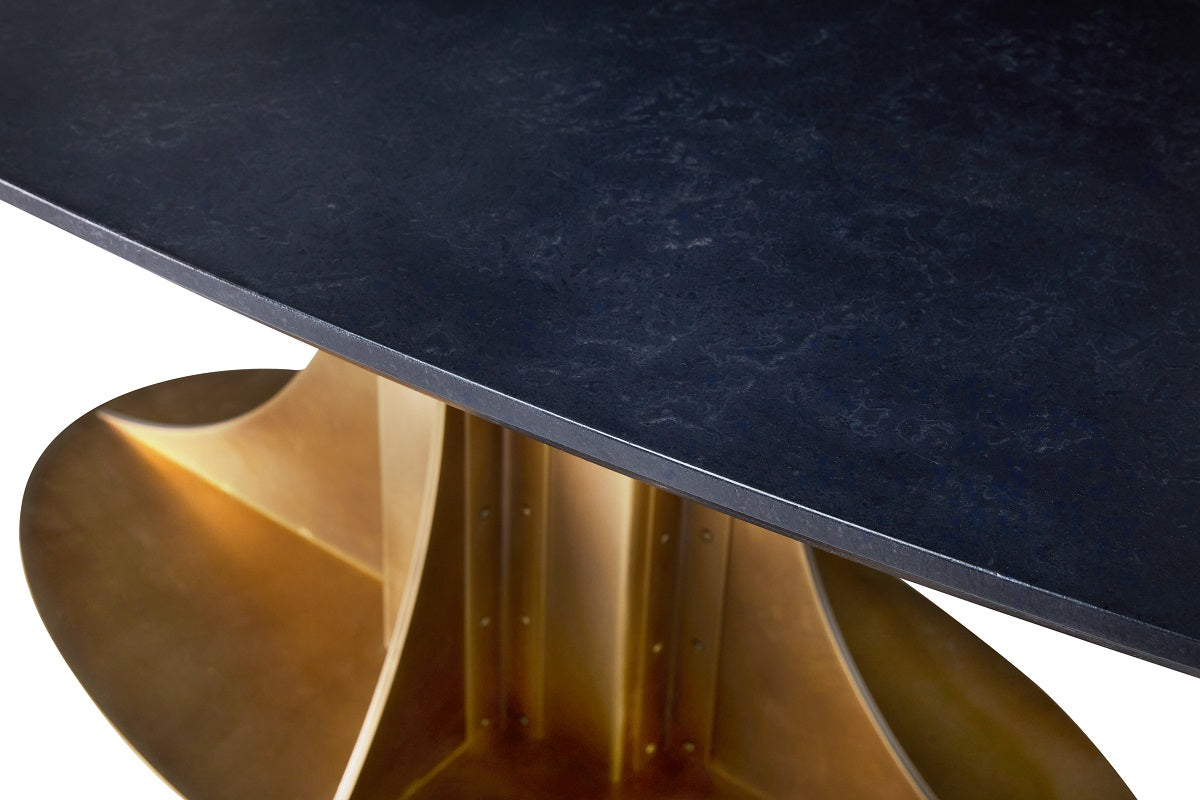 Close up of the concrete and metal table designed by Mark Jupiter.