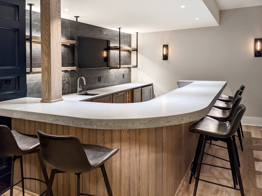 Seamless bar top that curves around the space.