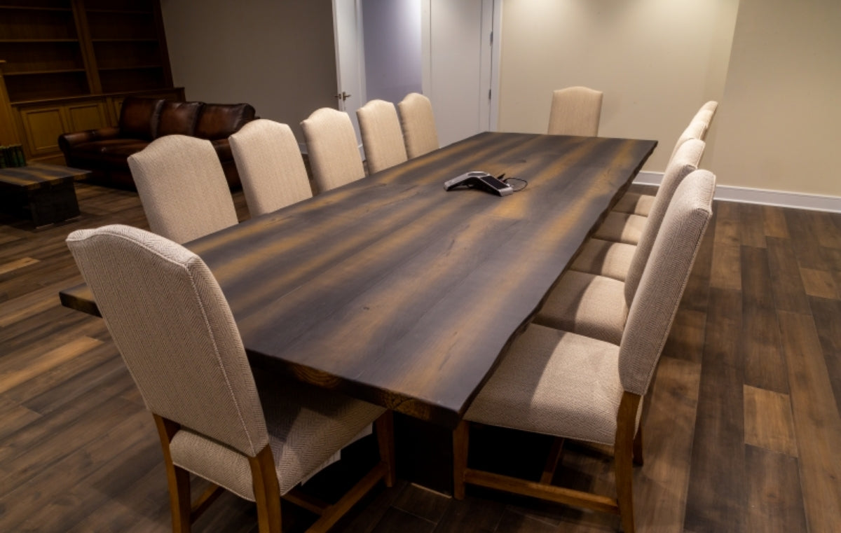 Custom wood look concrete dining table with dark graining. 