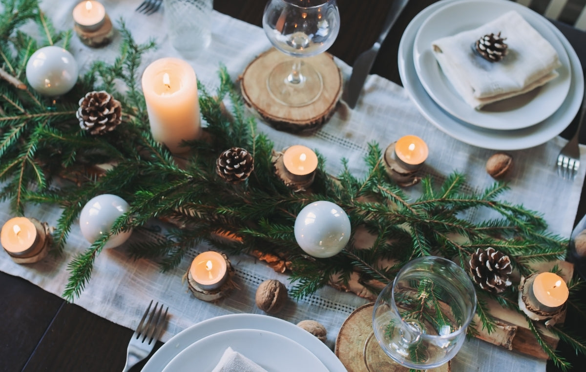 Table set with festive items for the holidays.