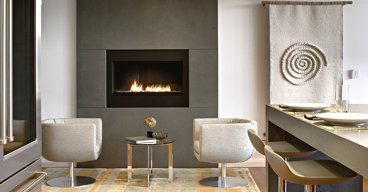 Modern wall mounted concrete fireplace
