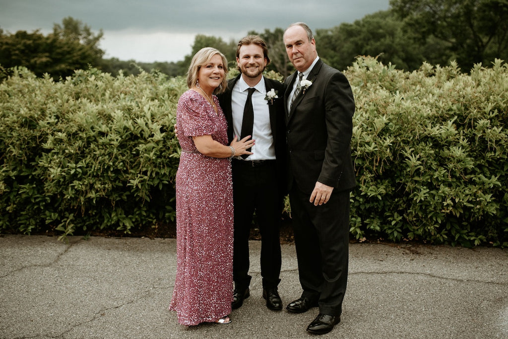 mother and father with groom