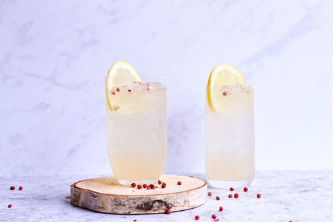 Glass of cooling non-alcoholic cocktails with lemon slices