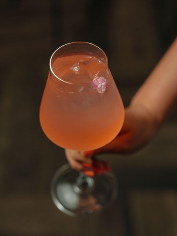 non-alcoholic Thai basil sangria in a wine glass