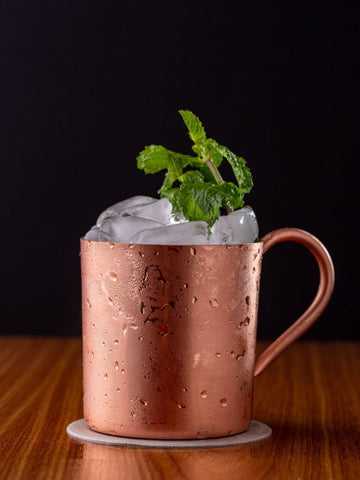 non-alcoholic mint julep in a metal glass with ice and mint