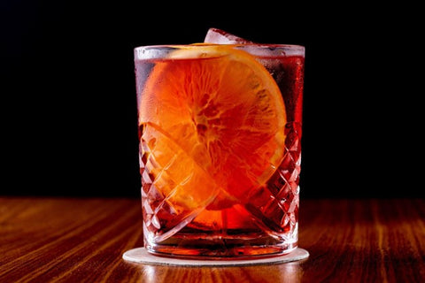 non-alcoholic negroni sbagliato in a glass on a table