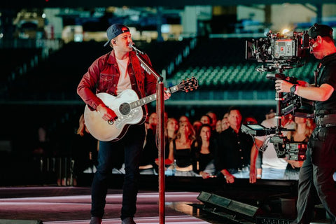 MOrgan Wallen at the Billboard Music Awards performing 98 Braves, leather covered mic stand by lisa cantalupo