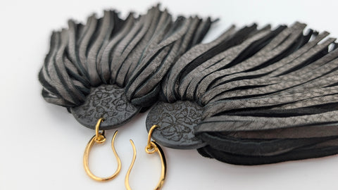 butterfly engraved matching fringe leather earrings