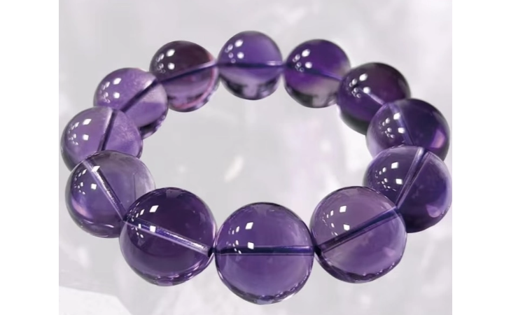 Crystal bead bracelet made with round amethyst stones