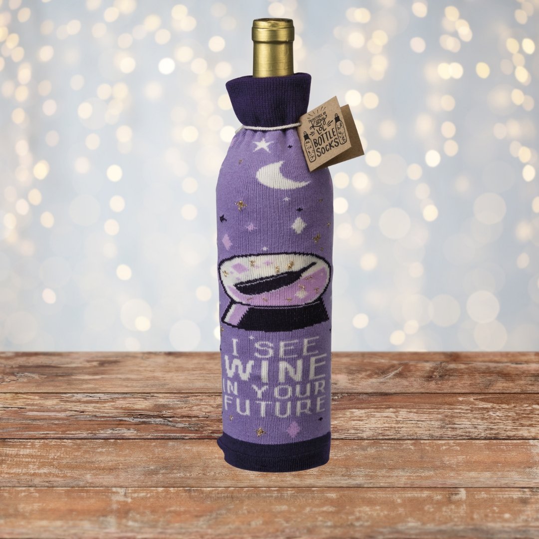 https://cdn.shopify.com/s/files/1/0620/8185/9777/files/I-See-Wine-In-Your-Future-Knit-Bottle-Sock-in-Purple-Reusable-Gift-Bag-for-Gifting-Wine.jpg?v=1699580690