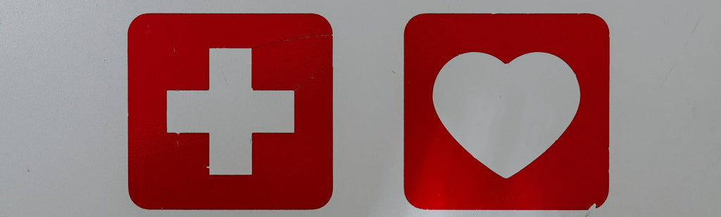 Image of a red cross and a heart