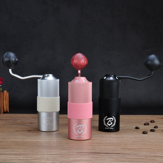 https://cdn.shopify.com/s/files/1/0621/0207/7691/products/BaristaSpaceHandGrinder_8_533x.jpg?v=1646688985