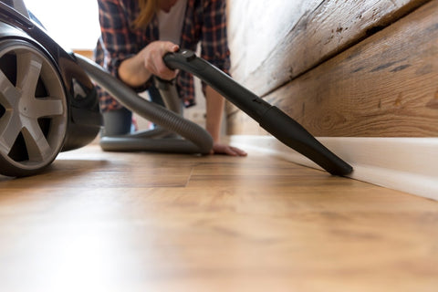 Lady Vacuuming Floors