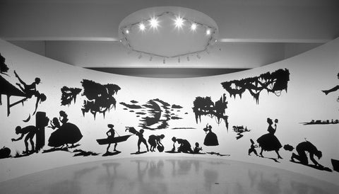 Kara Walker, “Slavery! Slavery! Presenting a GRAND and LIFELIKE Panoramic Journey into Picturesque Southern Slavery or Life at ‘Ol’ Virginny’s Hole (sketches from Plantation Life)” (1997), cut paper and adhesive on wall