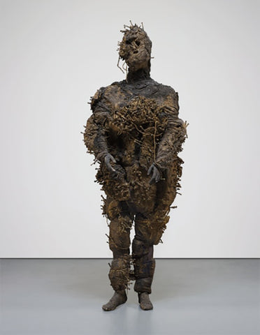 Tania Bruguera, “Destierro (Displacement),” 1998-2003, sculptural suit, Cuban mud, and nails