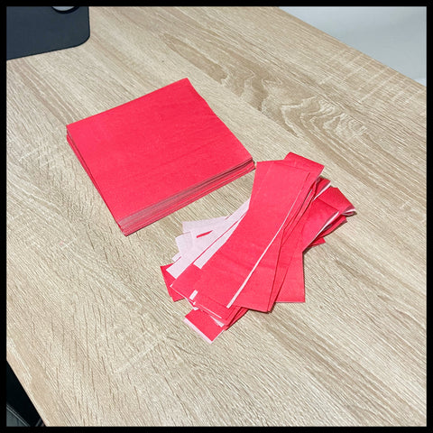 Red napkins cut into strips, purchased from the Dollar Tree