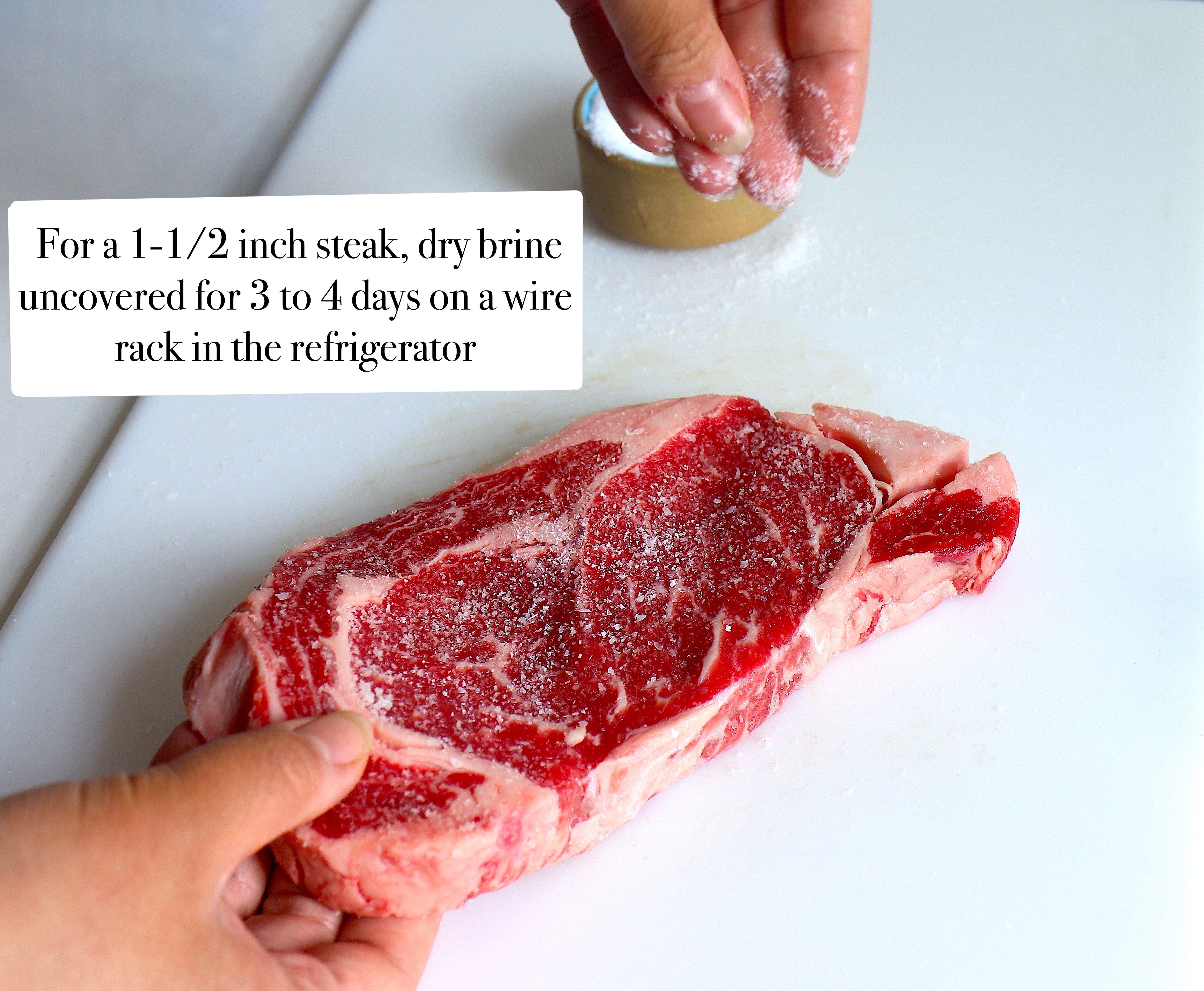 Salting a ribeye steak