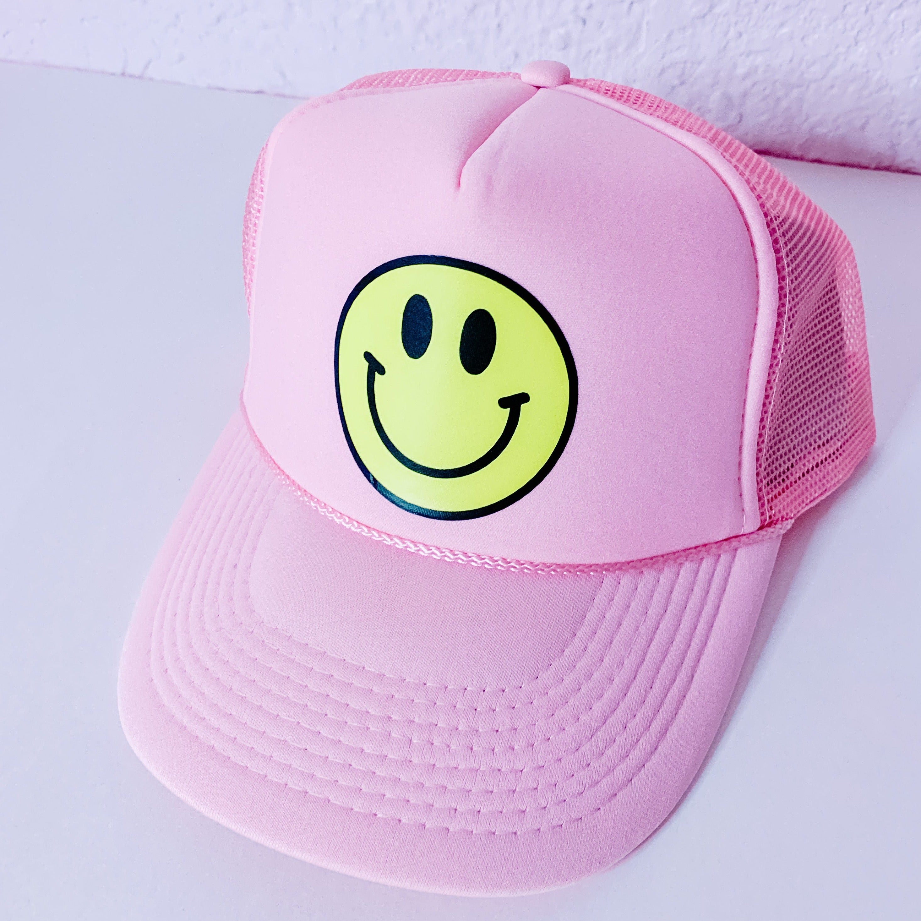 hot pink smiley face hat