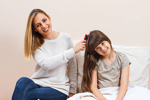 Preventing hair damage and breakage in Moms