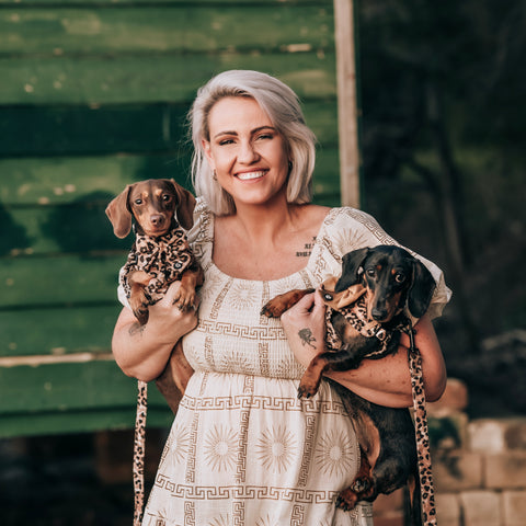 Puppco Owner Jas with two Sausage Dogs