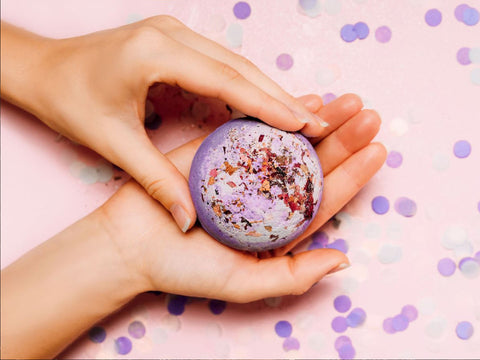 Woman holding homemade bath bomb